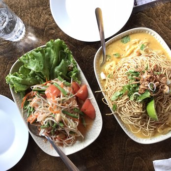 Wandee Thai Cuisine - two plates of food on a table - Thai Near Me - Ottawa, Ontario Wandee Thai Cuisine - two plates of food on a table - Thai Near Me - Ottawa, Ontario