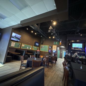 Coakley's - Plenty of tables and booths with some games and a stage for live music and outdoor patio with high tops and great breeze! - Irish Near Me - Buford, Georgia Coakley's - Plenty of tables and booths with some games and a stage for live music and outdoor patio with high tops and great breeze! - Irish Near Me - Buford, Georgia