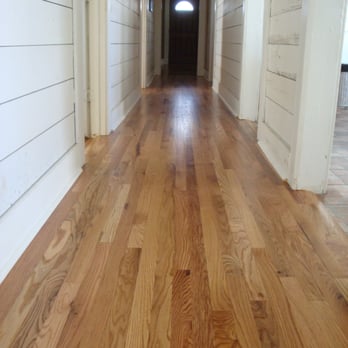 Kelley's Wood Floors - an empty hallway - Flooring Near Me Kelley's Wood Floors - an empty hallway - Flooring Near Me