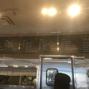 Poke Tiki - Photo that I awkwardly took while the guy is making my bowl - Seafood Near Me - Orange, California