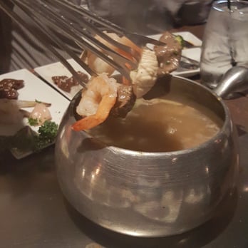 The Melting Pot - Meats in mojo fondue broth - Fondue Near Me - Duluth, Georgia