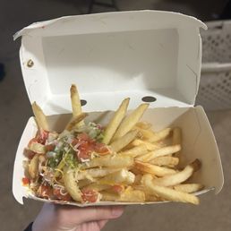 Why is it all to one side, and barely any toppings at that?! Don't waste your time lol. Make a baked potato AT HOME