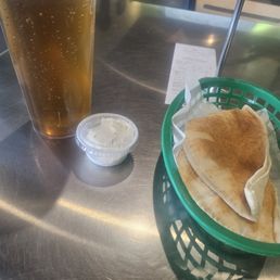 Mint tea and pita bread with garlic spread
