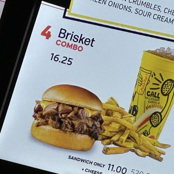 Dickey's Barbecue Pit - A picture of the brisket sandwich that they advertise that you're going to get - Barbeque Near Me - DFW  Airport, Texas