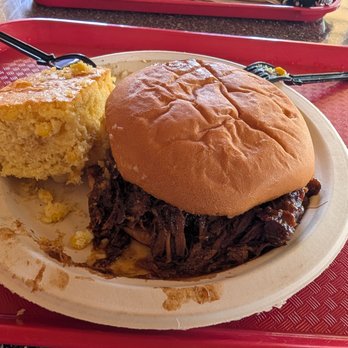 Boardwalk BBQ - BBQ pulled pork sandwich and cornbread, remnants of mac and cheese. - New American Near Me - Buena Park, California Boardwalk BBQ - BBQ pulled pork sandwich and cornbread, remnants of mac and cheese. - New American Near Me - Buena Park, California