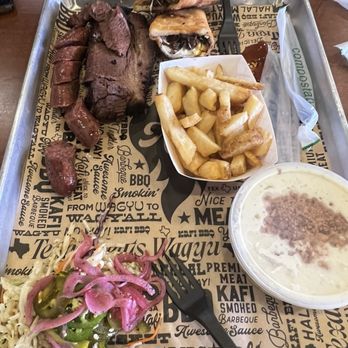 Kafi BBQ - Jalapeños cheddar sausage Fries Brisket empanada Cardamom banana pudding - Barbeque Near Me - Irving, Texas Kafi BBQ - Jalapeños cheddar sausage Fries Brisket empanada Cardamom banana pudding - Barbeque Near Me - Irving, Texas