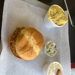Chicken sandwich, potato salad, cole slaw and banana pudding. Chicken sandwich, potato salad, cole slaw and banana pudding.