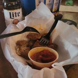 Tastes Raviolis and a bucket of Miller Lite