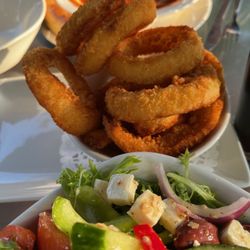 1929 Dining & Lounge - Hangover soup in the background, onion rings and Greek salad.