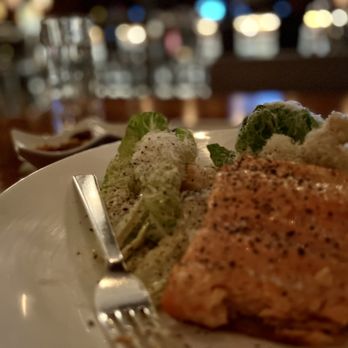 The Grant Grill - Caesar Salad with catch of the day, steelhead - Fish was cooked perfectly! Salad was overdressed. Still very good. - Diners Near Me - San Diego, California The Grant Grill - Caesar Salad with catch of the day, steelhead - Fish was cooked perfectly! Salad was overdressed. Still very good. - Diners Near Me - San Diego, California