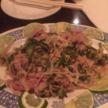 Pho Vinh - Don't know what you call this in English. But it's raw beef with lime that slowly cook the beef and also includes sweet onions - Vietnamese Near Me - Orlando, Florida Pho Vinh - Don't know what you call this in English. But it's raw beef with lime that slowly cook the beef and also includes sweet onions - Vietnamese Near Me - Orlando, Florida
