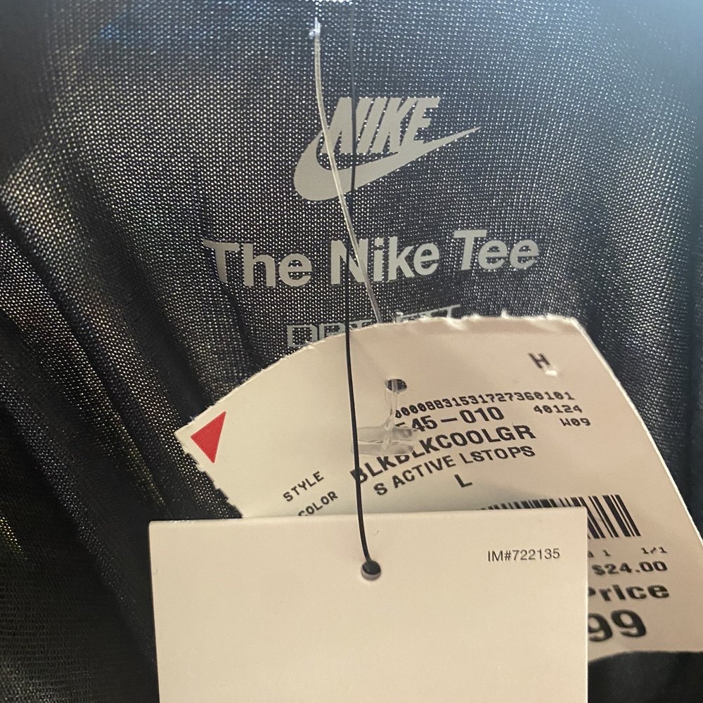 Hole in the shirt where associates placed price tag. Hole in the shirt where associates placed price tag.