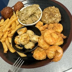 Story’s Seafood - Scallops , shrimp , French fries , crab cake ( salty ) cabbage & hush puppies