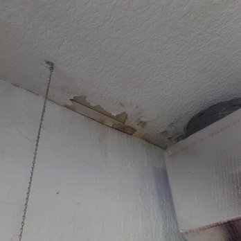 US Building Inspectors - active leak penetrating through the garage ceiling - Home Inspectors Near Me US Building Inspectors - active leak penetrating through the garage ceiling - Home Inspectors Near Me