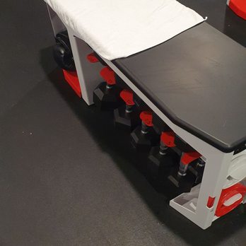 Rumble Boxing - The dumbbells and brass knuckles are under the bench. - Boxing Near Me - Burbank, California