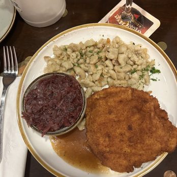 Old Castle Restaurant - Pork schnitzel with spaetzl and red cabbage. - German Near Me - Ruskin, Florida Old Castle Restaurant - Pork schnitzel with spaetzl and red cabbage. - German Near Me - Ruskin, Florida