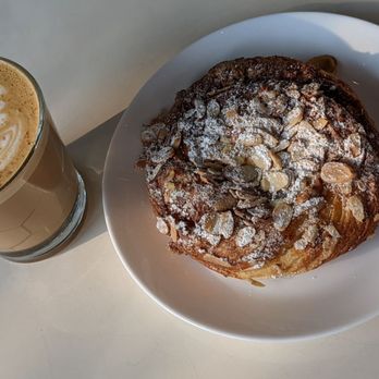 Santo Coffee - Panela latte and almond croissant - Coffee & Tea Near Me - Seattle, Washington Santo Coffee - Panela latte and almond croissant - Coffee & Tea Near Me - Seattle, Washington