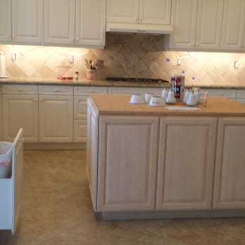 Elysian Contractors - a kitchen with white cabinets and white appliances - General Contractors Near Me - Solana Beach, California Elysian Contractors - a kitchen with white cabinets and white appliances - General Contractors Near Me - Solana Beach, California