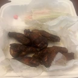 10 piece smoked chicken wing plate. What's terrible, I ate 3 of these wings before I realized this pink chewing in my plate!! EWWW!! 10 piece smoked chicken wing plate. What's terrible, I ate 3 of these wings before I realized this pink chewing in my plate!! EWWW!!