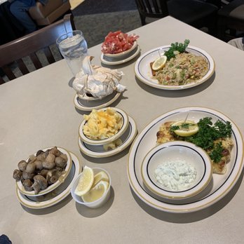 Cleburne Cafeteria - Blacked salmon, lemon cod, buttered mushrooms (absolute favorite) Mac & cheese and tomatoes with feta. Dessert was a lemon curd tart. - American Near Me - Houston, Texas