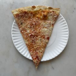 Pizzeria L'Antica - Pizzeria l'Antica's brick oven slice needs something to give it flavor... maybe it's a sauce issue.