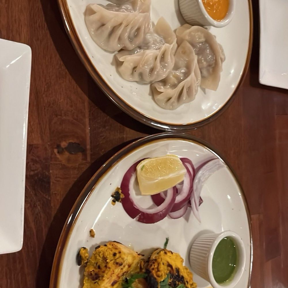 Momo chicken 6pcs Achari Chicken Tikka Momo chicken 6pcs Achari Chicken Tikka