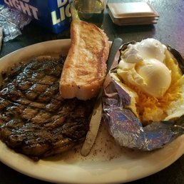 14oz ribeye, potato, and bread. Perfectly to the point! 14oz ribeye, potato, and bread. Perfectly to the point!