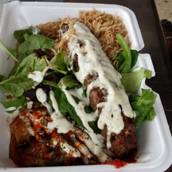 Kebabs To Go - Kobida plate with eggplant and brown rice. Extra white sauce. - Afghan Near Me - Irving, Texas