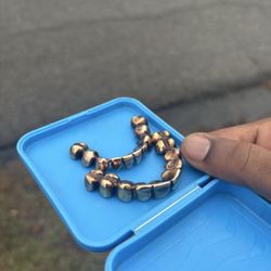 Top Dog Pawn - 18 grams of 14k Gold Teeth (Grills)