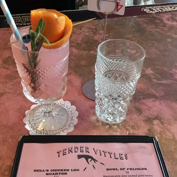 The Spirit Room - Summer menu drink with grapefruit & rosemary -- love the glassware and playing-card notice-of-dinner-order - Cocktail Bars Near Me - Rochester, New York The Spirit Room - Summer menu drink with grapefruit & rosemary -- love the glassware and playing-card notice-of-dinner-order - Cocktail Bars Near Me - Rochester, New York