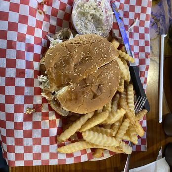 Shorty's BBQ - Jumbo pulled pork BBQ sandwich with thick crinkle fries and Cole slaw - Southern Near Me - Miami, Florida Shorty's BBQ - Jumbo pulled pork BBQ sandwich with thick crinkle fries and Cole slaw - Southern Near Me - Miami, Florida