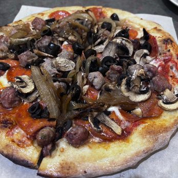 Rudolfo's - Paesano Pizza - Sausage, Pepperoni, Mushroom, Olives and Caramelized Onion On Doppio Zerro crust - Italian Near Me - Pacific Grove, California Rudolfo's - Paesano Pizza - Sausage, Pepperoni, Mushroom, Olives and Caramelized Onion On Doppio Zerro crust - Italian Near Me - Pacific Grove, California
