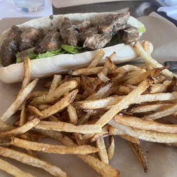 Central Cafe - Jerk chicken sandwich special with fries - New American Near Me - Bradenton, Florida
