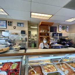 Counter with hot food on the right