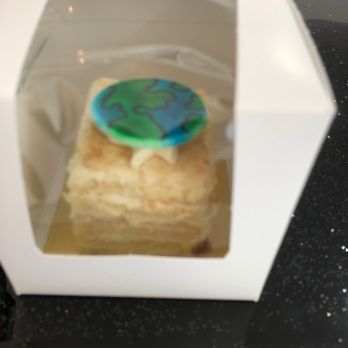 Cakes By Katya - My free Sour Cream Cake for the YELP Event. Looks delicious ! (Drool drool)  Love the "World" on top of the cake. - Custom Cakes Near Me - North Tonawanda, New York