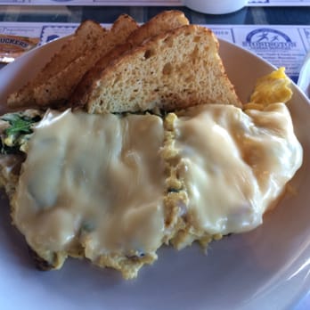 Kitchen Little - #9- omelette with mushrooms, spinach, cream cheese, crab & American cheese with gluten free toast - Breakfast & Brunch Near Me - Mystic, Connecticut Kitchen Little - #9- omelette with mushrooms, spinach, cream cheese, crab & American cheese with gluten free toast - Breakfast & Brunch Near Me - Mystic, Connecticut