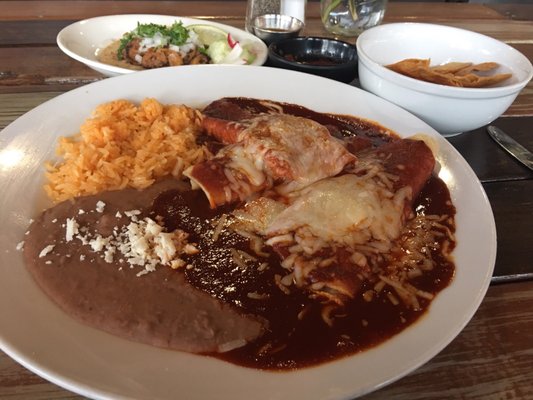 Photo of Taqueria Cantina - Seattle, WA, US. Cheese enchilada with red sauce