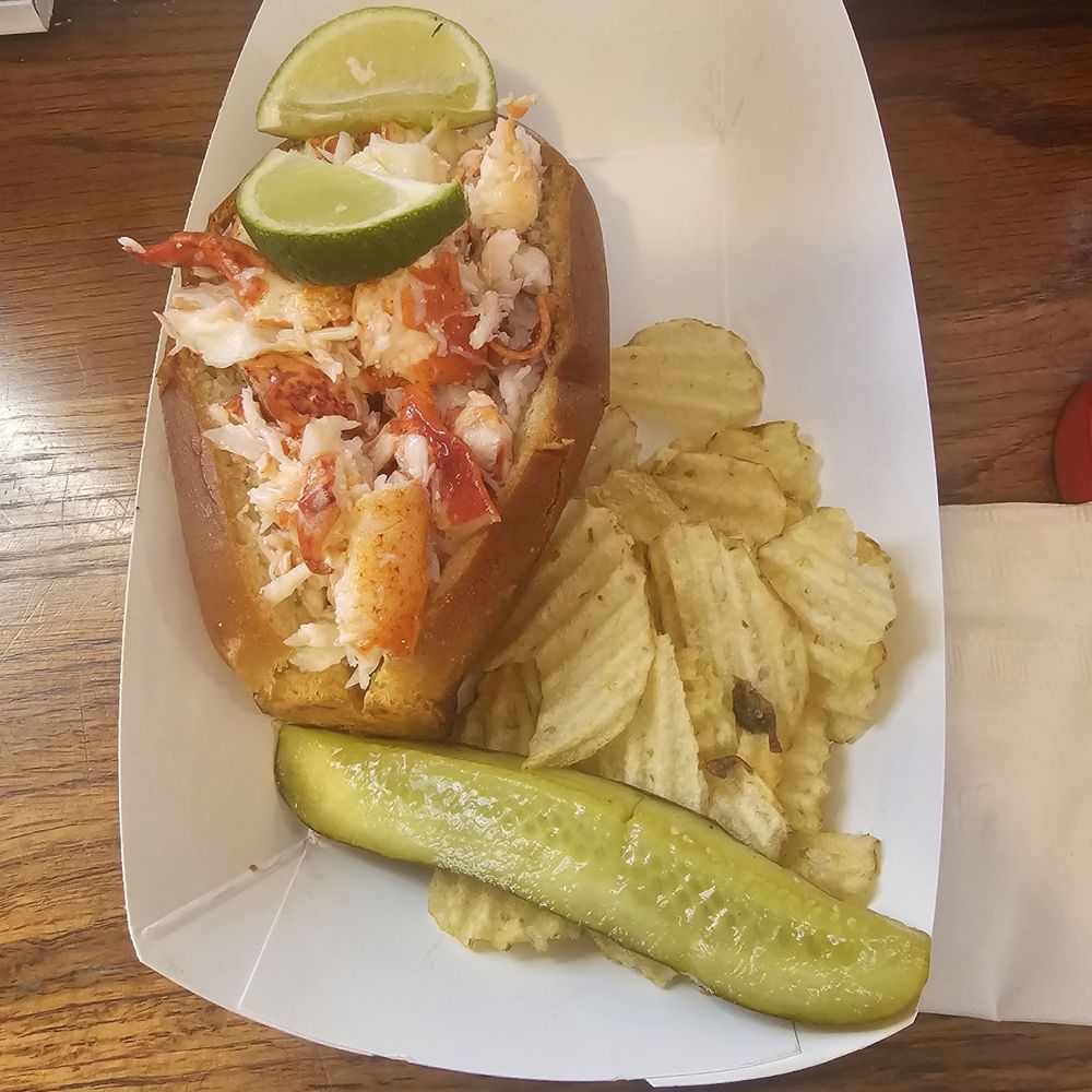 Key West lobster roll with chips & a pickle! Delicious!!! Key West lobster roll with chips & a pickle! Delicious!!!
