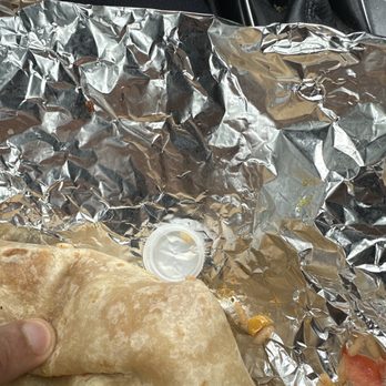 Don Chile Mexican Restaurant - Water bottle cap inside wrapped with burrito - Mexican Near Me - Houston, Texas Don Chile Mexican Restaurant - Water bottle cap inside wrapped with burrito - Mexican Near Me - Houston, Texas