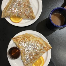 Dairy free French toast crepe and a dairy free dark chocolate and strawberry crepe Dairy free French toast crepe and a dairy free dark chocolate and strawberry crepe