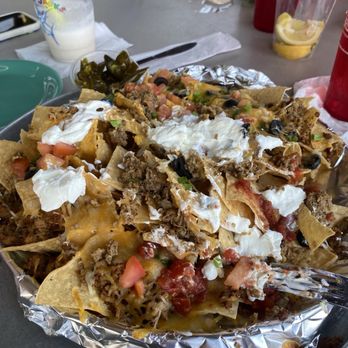 Tacky Jacks - Mexican garbage. That is the name of this dish. It is delicious. - Seafood Near Me - Gulf Shores, Alabama Tacky Jacks - Mexican garbage. That is the name of this dish. It is delicious. - Seafood Near Me - Gulf Shores, Alabama