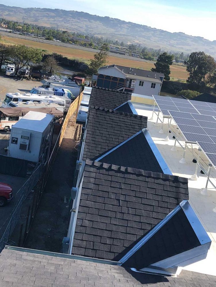 Slide of Henris Roofing