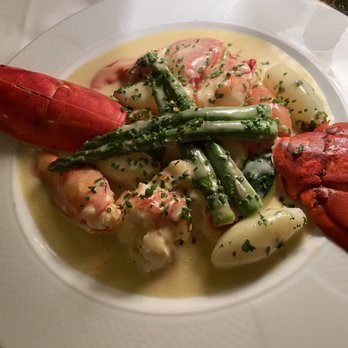 Le Crocodile Restaurant - 1 & 1/2 Pound Atlantic Lobster, Steamed, Shelled, Turned Vegetable, and Saffron Beurre Blanc. Delicious - French Near Me - Vancouver, British Columbia Le Crocodile Restaurant - 1 & 1/2 Pound Atlantic Lobster, Steamed, Shelled, Turned Vegetable, and Saffron Beurre Blanc. Delicious - French Near Me - Vancouver, British Columbia