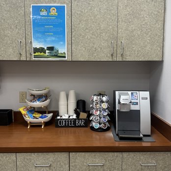 Camping World - Robertsdale - Coffee bar and Keurig in the waiting lounge. - RV Dealers Near Me - Robertsdale, Alabama