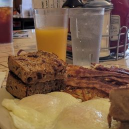 Eggs over easy crispy bacon and homemade cherry walnut bread. Also a great chef salad so fresh.