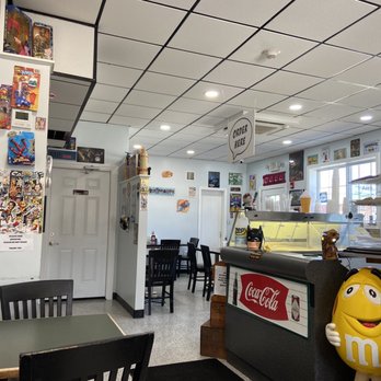 Uptown Comic Book Cafe - the interior of the store - Burgers Near Me - Salisbury, Massachusetts Uptown Comic Book Cafe - the interior of the store - Burgers Near Me - Salisbury, Massachusetts