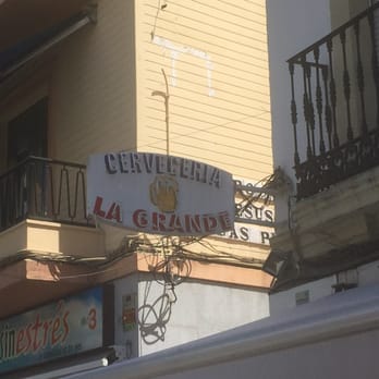La Grande - The sign - for when the awning just does not show you the love - Tapas Bars Near Me - Seville, SE La Grande - The sign - for when the awning just does not show you the love - Tapas Bars Near Me - Seville, SE