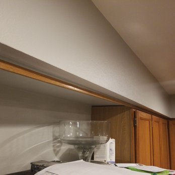 Action Installations - This is the way he installed my Cabinetry and left it...wth - Patio Coverings Near Me