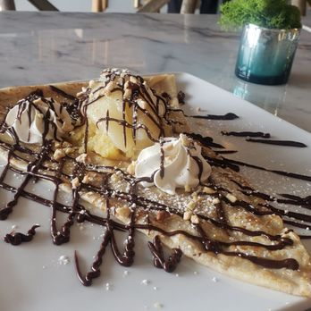 Le Cafe Du Val - Crepes for breakfast! Le Poire has a poached pear, drizzled with chocolate ganache and Frangiapane, mixed nuts - Cafes Near Me - Henderson, Nevada Le Cafe Du Val - Crepes for breakfast! Le Poire has a poached pear, drizzled with chocolate ganache and Frangiapane, mixed nuts - Cafes Near Me - Henderson, Nevada