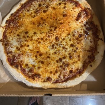 Pizza Denn - a person standing in front of a box of pizza - Pizza Near Me - Finleyville, Pennsylvania Pizza Denn - a person standing in front of a box of pizza - Pizza Near Me - Finleyville, Pennsylvania